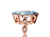 Rose gold Fancy Blue Marquise Cut Solitaire Diamond Ring with Infinity Twist Band and Four-Prong Setting_29