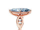 Rose gold Fancy Blue Marquise  Solitaire Twist Band with Leaf Prong Setting