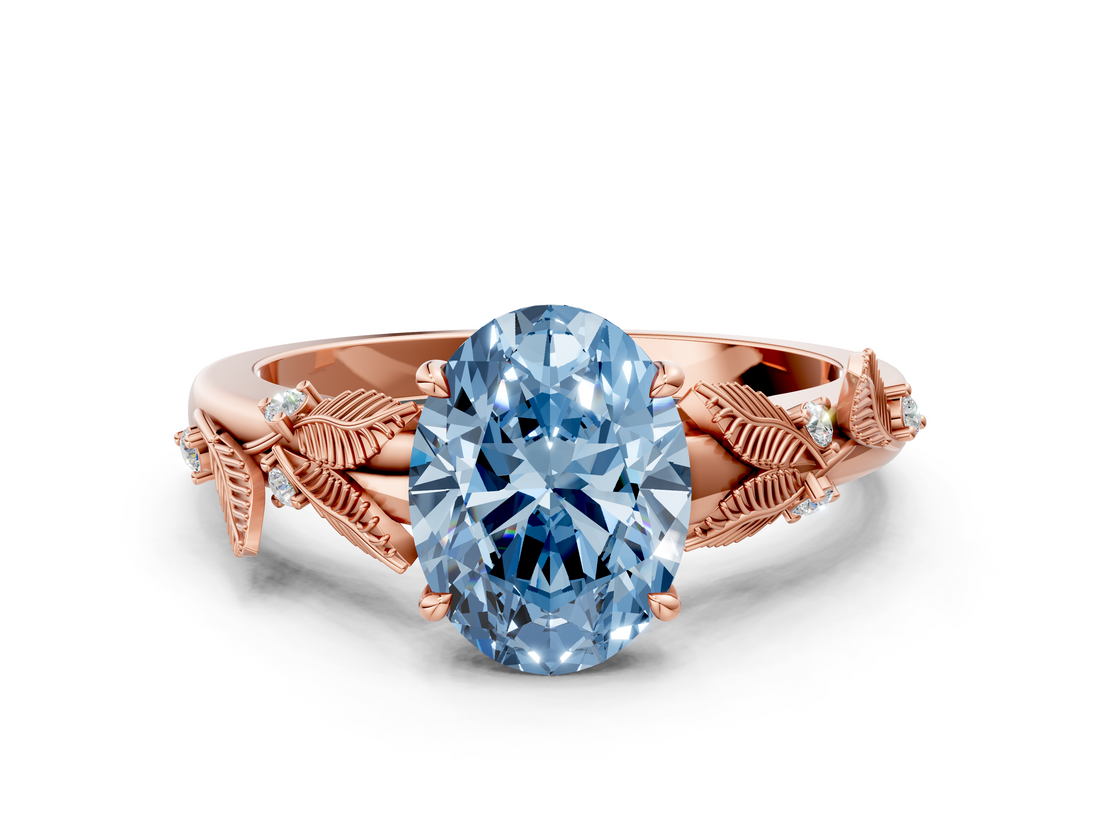 Rose gold Fancy Blue Oval  Brilliant Solitaire with Leaf Motif Band and Four-Prong Setting_62