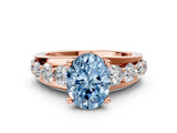 Rose gold Fancy Blue Oval  Brilliant Solitaire with Side Stones on a Pave Band and Four-Prong Setting_24