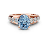 Rose gold Fancy Blue Oval  Brilliant Solitaire with Side Stones on a Pave Band and Four-Prong Setting_37
