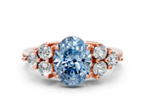 Rose gold Fancy Blue Oval Cut Brilliant Diamond Cluster Accent Solitaire Ring with Prong Setting