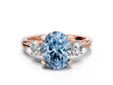 Rose gold Fancy Blue Oval Cut Brilliant Three-Stone Diamond Ring with Pavé Band and Four-Prong Setting_3