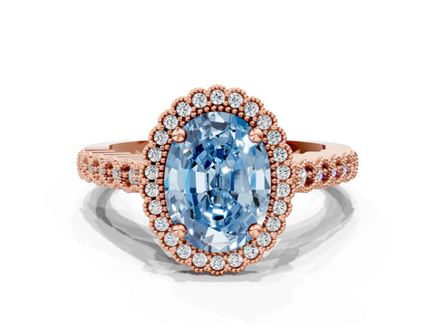 Rose gold Fancy Blue Oval Cut Cut Halo Pavé Solitaire Ring with Milgrain Band