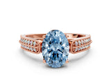 Rose gold Fancy Blue Oval Cut Cut Pave Split Shank Engagement Ring with Four-Prong Setting
