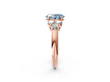 Rose gold Fancy Blue Oval  Cut Diamond Cluster Ring with Round Accent Stones and Prong Setting on a Classic Band_51