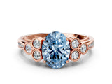 Rose gold Fancy Blue Oval  Cut Diamond Engagement Ring with Bezel Set Round Side Stones and Prong Setting_49