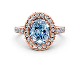 Rose gold Fancy Blue Oval Cut Diamond Halo Ring with Pavé Band and Prong Setting