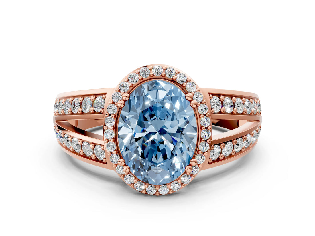 Rose gold Fancy Blue Oval Cut Diamond Halo Ring with Split Shank Pavé Band and Four-Prong Setting