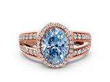Rose gold Fancy Blue Oval Cut Diamond Halo Ring with Split Shank Pavé Band and Four-Prong Setting