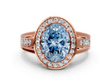 Rose gold Fancy Blue Oval Cut Diamond Halo Ring with Split Shank and Bezel Accents and Prong Setting