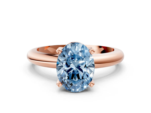 Rose gold Fancy Blue Oval Cut Diamond Solitaire Engagement Ring with Round Band and Four-Prong Setting