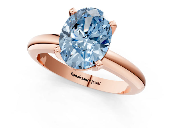 Rose gold Fancy Blue Oval Cut Diamond Solitaire Engagement Ring with Round Band and Four-Prong Setting