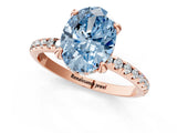Rose gold Fancy Blue Oval Cut Diamond Solitaire Ring with Four-Prong Setting and Pavé Band_4