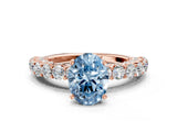 Rose gold Fancy Blue Oval Cut Diamond Solitaire Ring with Shared Prong Pavé Band and Four-Prong Setting_57