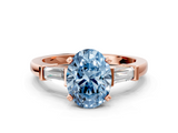 Rose gold Fancy Blue Oval  Cut Diamond Solitaire Ring with Tapered Baguette Accents and Four-Prong Setting_58