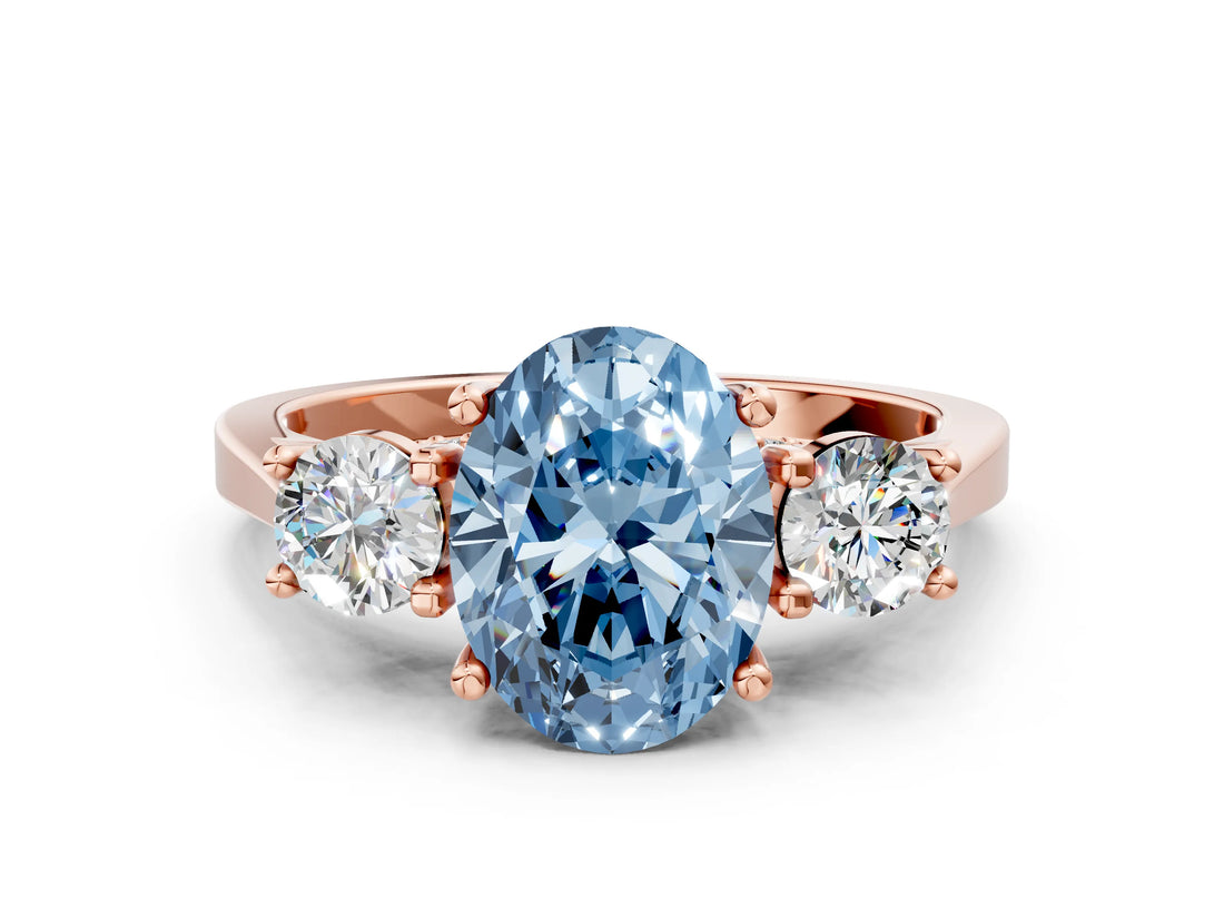 Rose gold Fancy Blue Oval Cut Diamond Three-Stone Engagement Ring with Prong Setting and Pavé Band