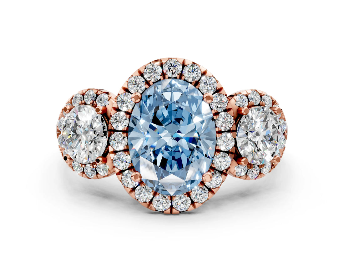 Rose gold Fancy Blue Oval Cut Diamond Three-Stone Halo Ring with Prong Setting and Pavé Accents