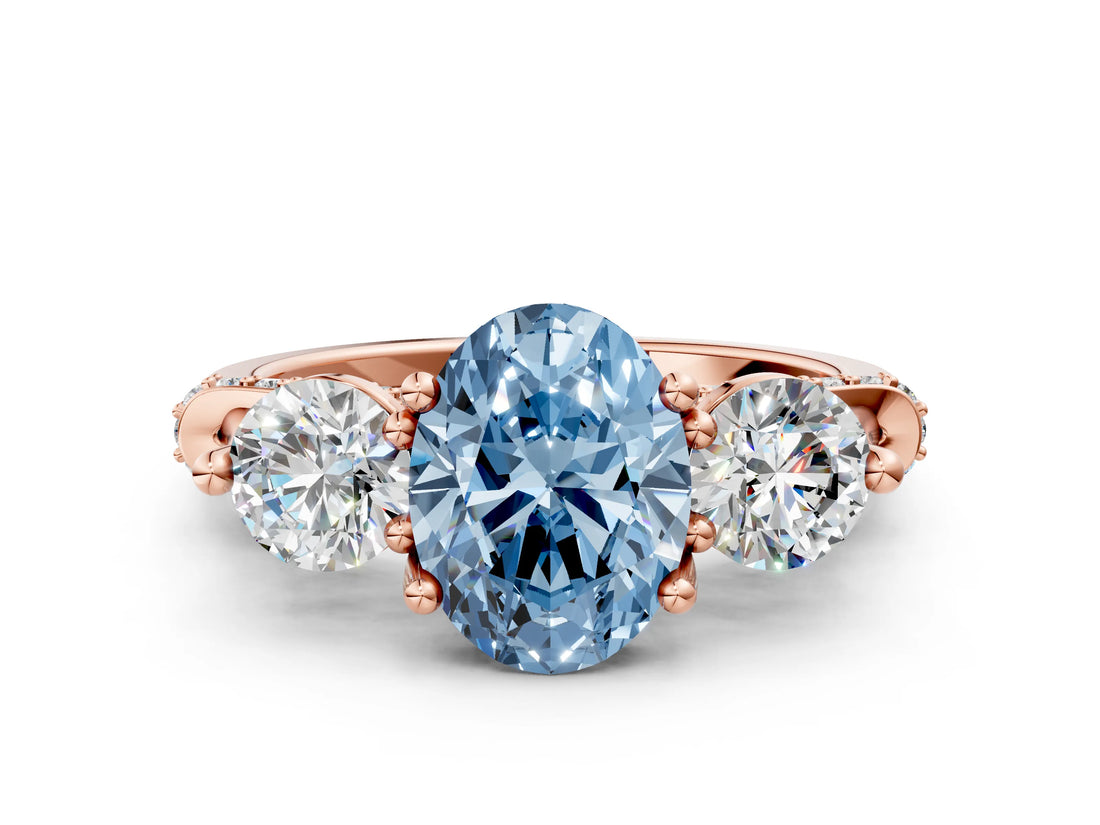 Rose gold Fancy Blue Oval Cut Diamond Three-Stone Ring with Prong Setting and Pavé Band