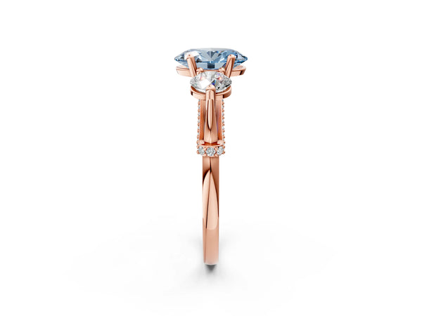 Rose gold Fancy Blue Oval Cut Diamond Three-Stone Ring with Prong Setting and Pavé Band