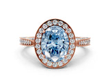 Rose gold Fancy Blue Oval Cut Halo Diamond Engagement Ring with Split Shank Band and Four-Prong Setting