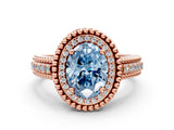 Rose gold Fancy Blue Oval Cut Halo Diamond Ring with Beaded Split Shank and Four-Prong Setting