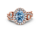 Rose gold Fancy Blue Oval Cut Halo Diamond Ring with Milgrain and Bezel Accents on a Split Shank Band_12