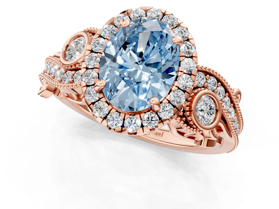 Rose gold Fancy Blue Oval Cut Halo Diamond Ring with Milgrain and Bezel Accents on a Split Shank Band