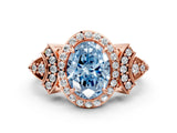Rose gold Fancy Blue Oval Cut Halo Diamond Split Shank Engagement Ring with Four-Prong Setting