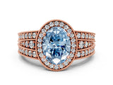 Rose gold Fancy Blue Oval Cut Halo Diamond Split Shank Ring with Prong Setting