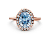 Rose gold Fancy Blue Oval Cut Halo Round Diamond Solitaire Ring with Pavé Band and Four-Prong Setting