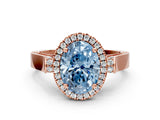 Rose gold Fancy Blue Oval Cut Halo Round Diamond Twist Band with Four-Prong Setting