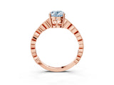 Rose gold Fancy Blue Oval Cut Solitaire Diamond Ring with Infinity Twist Band and Four-Prong Setting_3