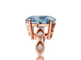 Rose gold Fancy Blue Oval Cut Solitaire Diamond Ring with Infinity Twist Band and Four-Prong Setting_5