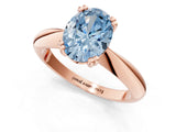 Rose gold Fancy Blue Oval  Cut Solitaire Engagement Ring with Tapered Band and Four-Prong Setting 1