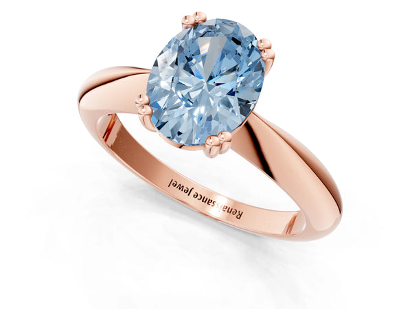 Rose gold Fancy Blue Oval  Cut Solitaire Engagement Ring with Tapered Band and Four-Prong Setting