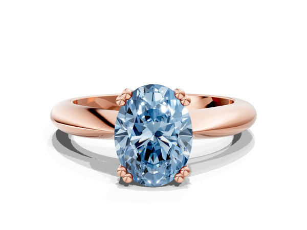 Rose gold Fancy Blue Oval  Cut Solitaire Engagement Ring with Tapered Band and Four-Prong Setting