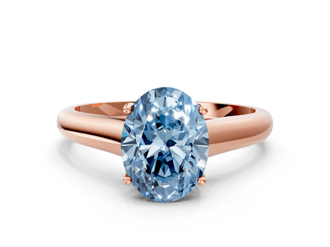 Rose gold Fancy Blue Oval Cut Solitaire Engagement Ring with Tapered Band and Four-Prong Setting_3