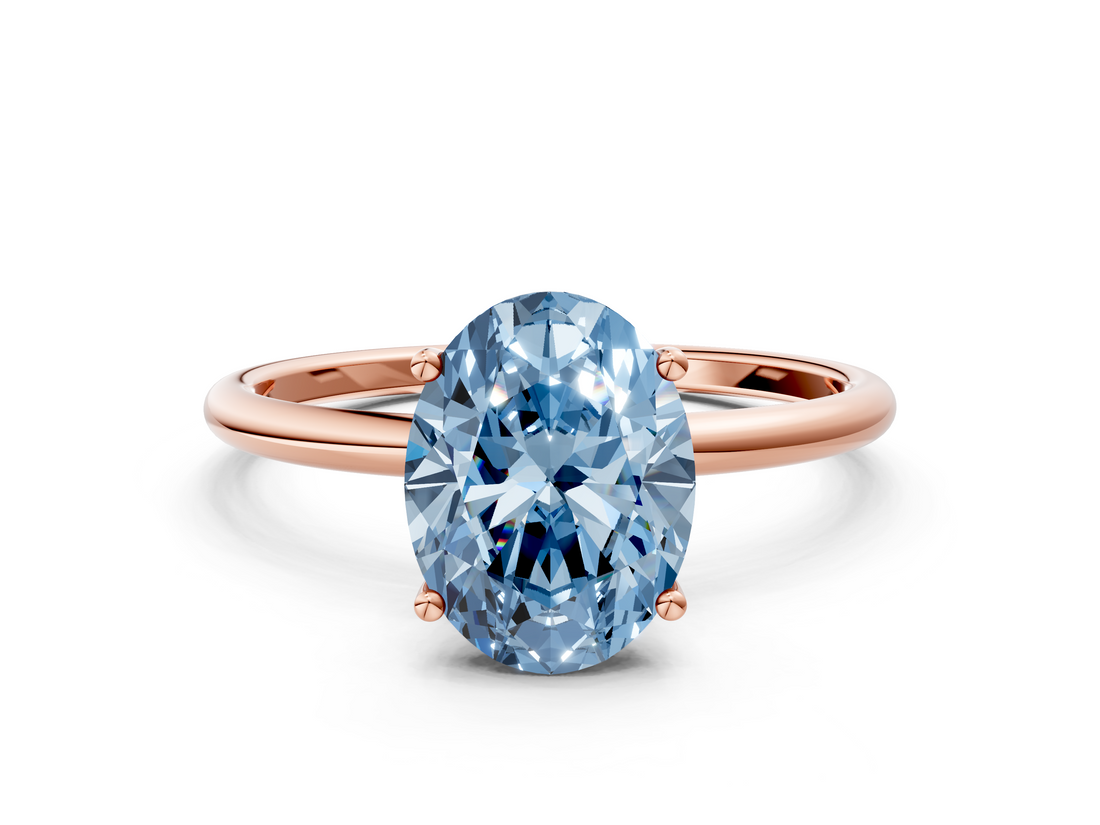 Rose gold Fancy Blue Oval  Cut Solitaire Engagement Ring with Thin Band and Four-Prong Setting_3