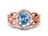 Rose gold Fancy Blue Oval Cut Solitaire Intertwined Band Prong Setting Ring