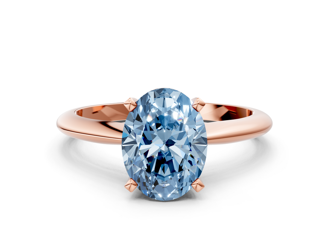 Rose gold Fancy Blue Oval  Cut Solitaire Ring with Four-Prong Setting on a Classic Band_71