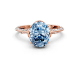Rose gold Fancy Blue Oval Cut Solitaire Split Shank Pave Diamond Engagement Ring with Four-Prong Setting_36