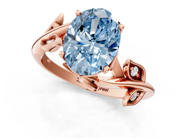 Rose gold Fancy Blue Oval Cut Solitaire Twist Engagement Ring with Leaf Accents and Prong Setting