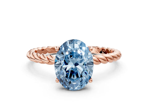 Rose gold Fancy Blue Oval Cut Solitaire Twisted Band 4-Prong Ring