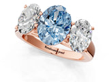 Rose gold Fancy Blue Oval Cut Three-Stone Diamond Ring with Prong Setting on a Classic Band_13