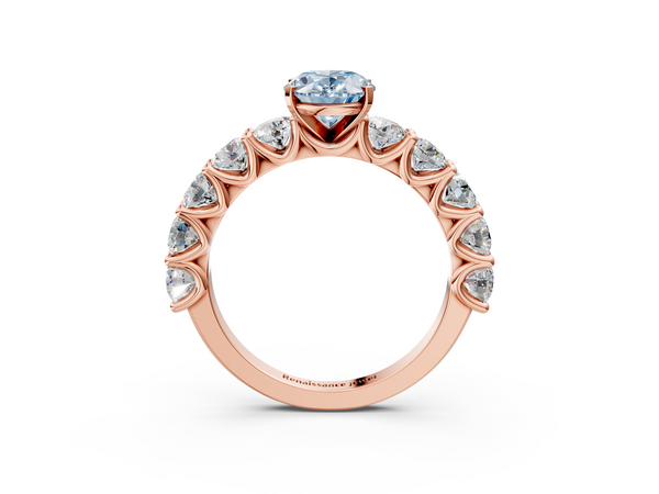 Rose gold Fancy Blue Oval Cut Diamond Prong Setting with Side Stones on a Pave Band