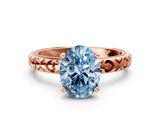 Rose gold Fancy Blue Oval  Solitaire Diamond Engagement Ring with XO Engraved Band and Four-Prong Setting