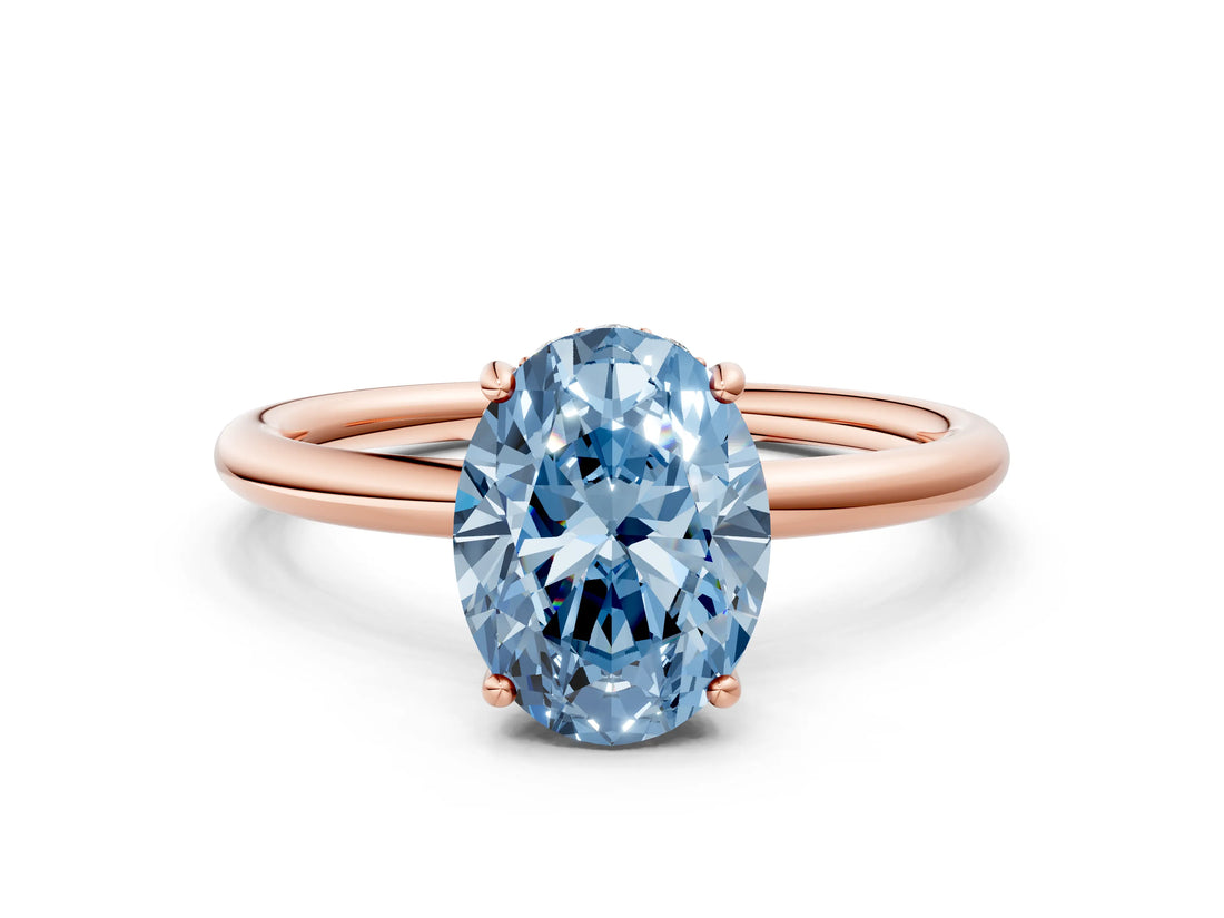 Rose gold Fancy Blue Oval  Solitaire Diamond Ring with a Classic Band and Four-Prong Setting 1
