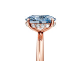 Rose gold Fancy Blue Oval  Solitaire Diamond Ring with a Classic Band and Four-Prong Setting