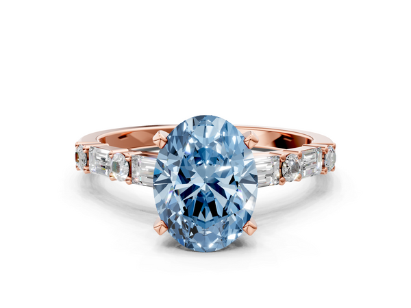 Rose gold Fancy Blue Oval Cut Diamond Solitaire with Side Baguettes and Channel Set Band
